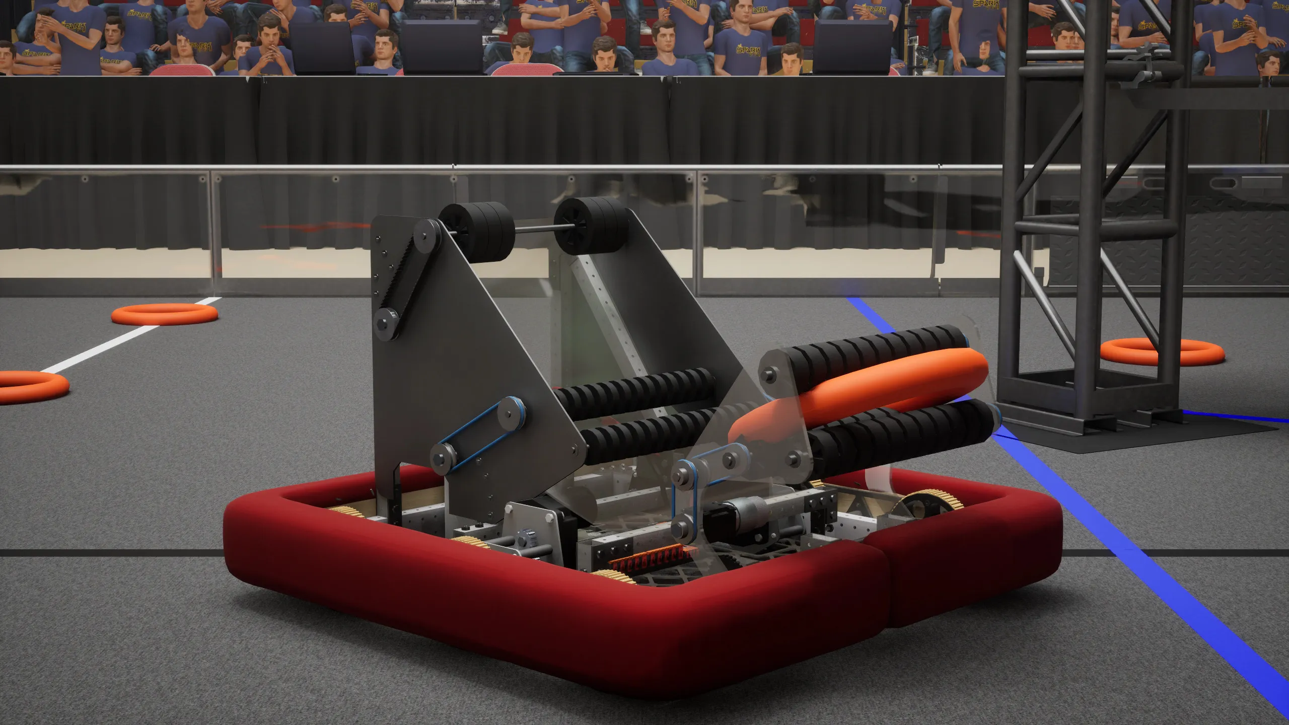A robot collecting a note on the Catalyst field, with the arena stands behind it.